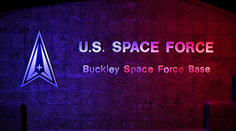 The U.S. Space Force sign revealing the new base name is illuminated at Buckley Air Force Base, Colo., June 2, 2021. The base renaming ceremony changing the name to Buckley Space Force Base took place on June 4 and was followed by the Buckley Garrison Assumption of Command ceremony. (U.S. Space Force photo by Senior Airman Danielle McBride)