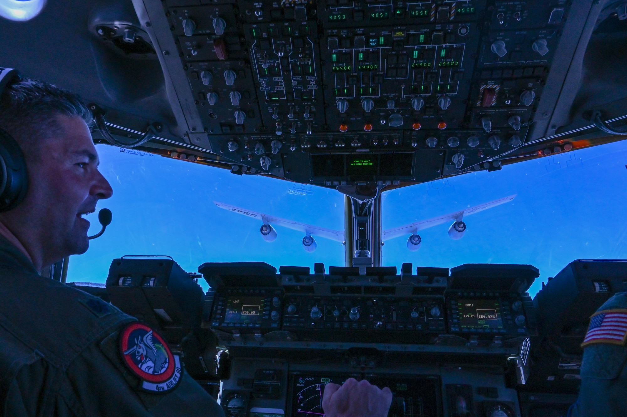 U.S. Air Force Lt. Col. Brandon Gorab, 4th Airlift Squadron pilot, flies a C-17 Globemaster III over Sacramento, California, June 2, 2021. The 4th AS hosted the Airmen Experience for an orientation flight where they conducted an air refueling exercise. (U.S. Air Force photo by Airman 1st Class Callie Norton)