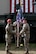 U.S. Air Force Col. Travis Woodworth (left), the 1st Air Support Operations Group commander, passes the 3rd Air Support Operations Squadron (ASOS) guidon to Lt. Col. Kyle Mattie, the 3rd ASOS commander, during a change of command ceremony at Fort Wainwright, Alaska, June 4, 2021.