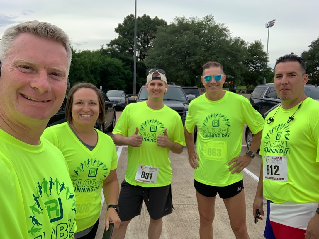 Leaders from the 64th AEG took time to demonstrate their ongoing commitment to teamwork by celebrating Global Running Day with an official 5K race.