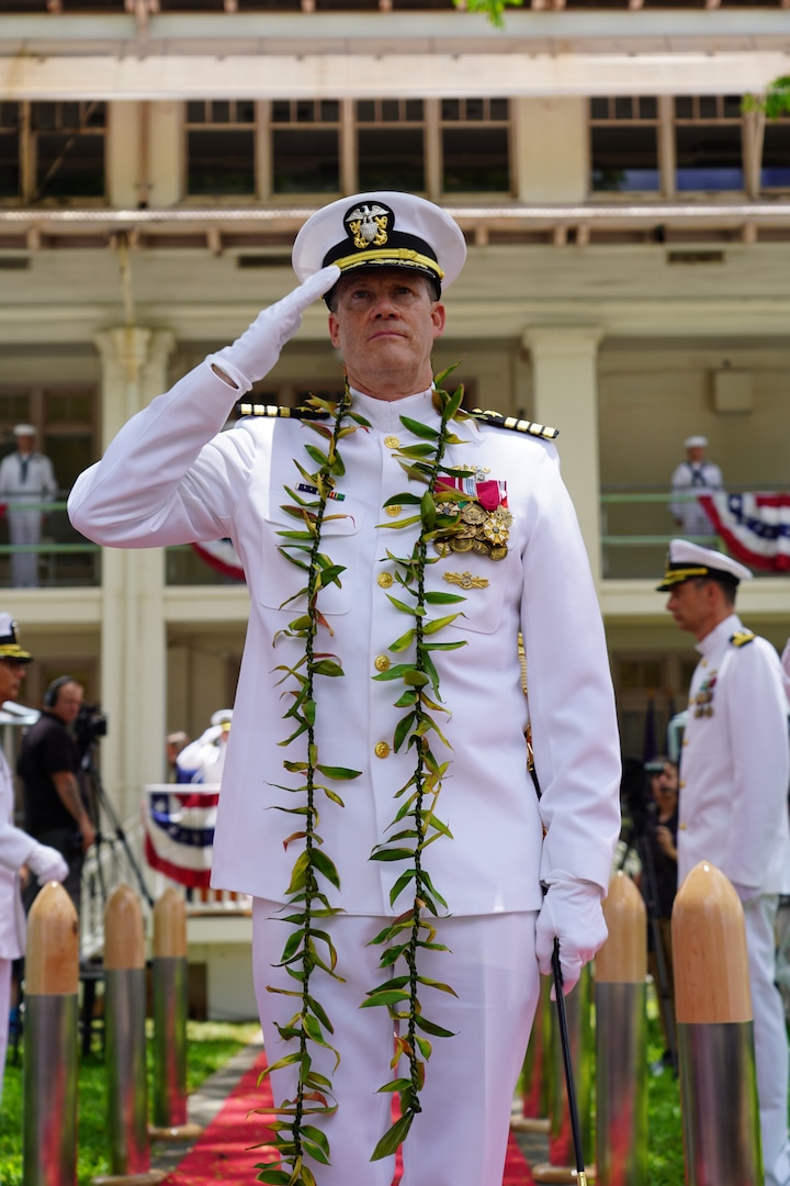Pearl Harbor, Hawaii (June 4, 2021) Captain Greg Burton, outgoing commander of Pearl Harbor Naval Shipyard and Intermediate Maintenance Facility (PHNSY & IMF), is piped ashore for a final time, marking the end of a long and successful 34-year career as an officer in the United States Navy.  PHNSY & IMF's change of command ceremony.  PHNSY & IMF is a field activity of NAVSEA and a one-stop regional maintenance center for the Navy’s surface ships and submarines. (U.S. Navy photo by Justice Vannatta/Released)