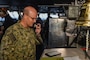 PHILIPPINE SEA (June 2, 2021) Vice Adm. Bill Merz, commander, U.S. 7th Fleet, addresses the crew of the U.S. Navy’s only forward-deployed aircraft carrier, USS Ronald Reagan (CVN 76), from the pilot house. During Merz’s visit he attended meetings with warfare commanders and provided a message to the crew over the ship’s announcement system. Ronald Reagan, the flagship of Carrier Strike Group 5, provides a combat-ready force that protects and defends the United States, as well as the collective maritime interests of its allies and partners in the Indo-Pacific region.