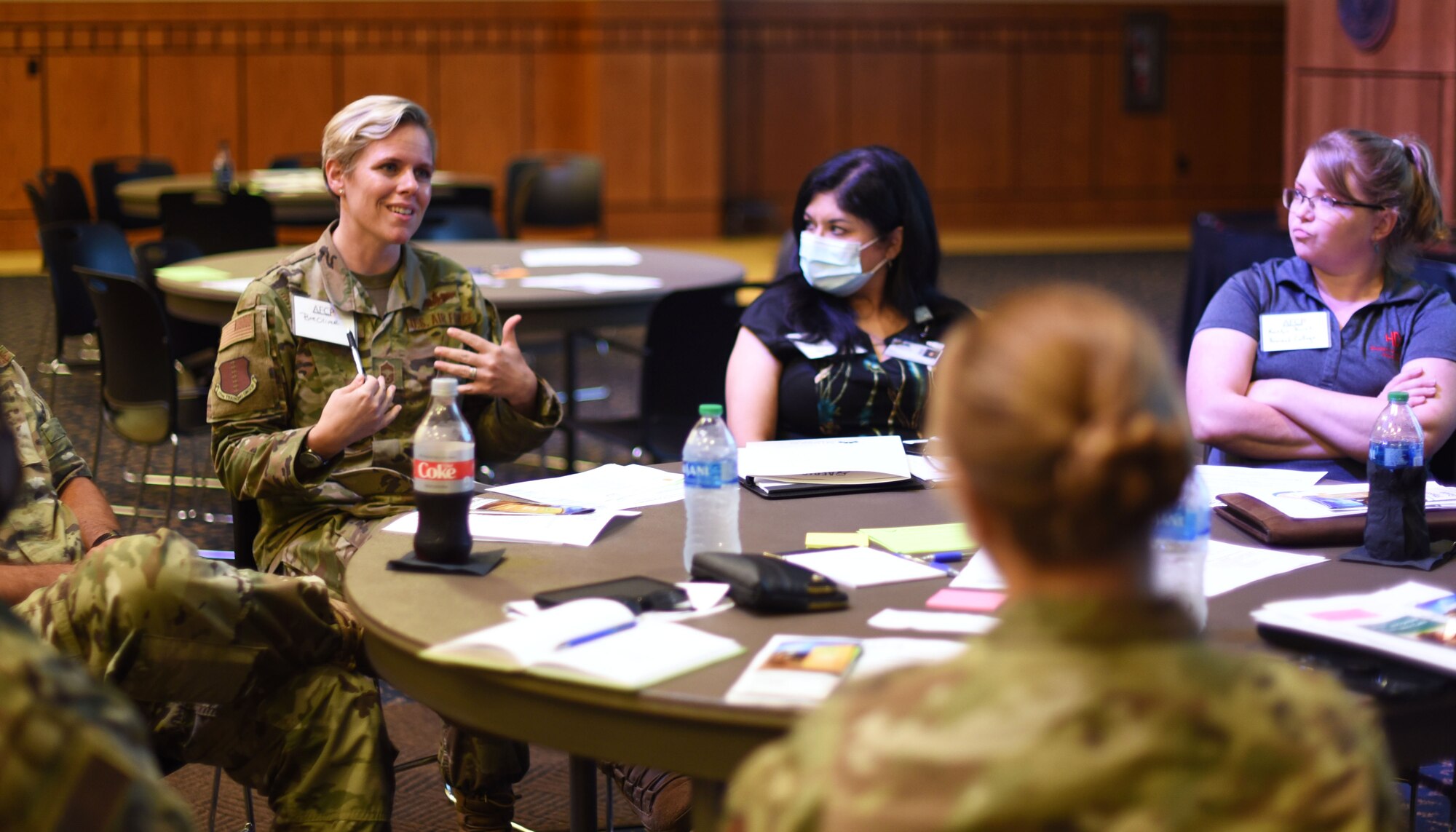 U.S. Air Force Chief Master Sgt. Breana Oliver, 17th Training Group superintendent, presents new partnership ideas at the Goodfellow Air Force Community Partnership Program quarterly update meeting at Angelo State University’s Houston Harte University Center in San Angelo, Texas, June 3, 2021. The base and community saved approximately $6 million in 2020 by leveraging resources and capabilities together.  (U.S. Air Force photo by Senior Airman Abbey Rieves)