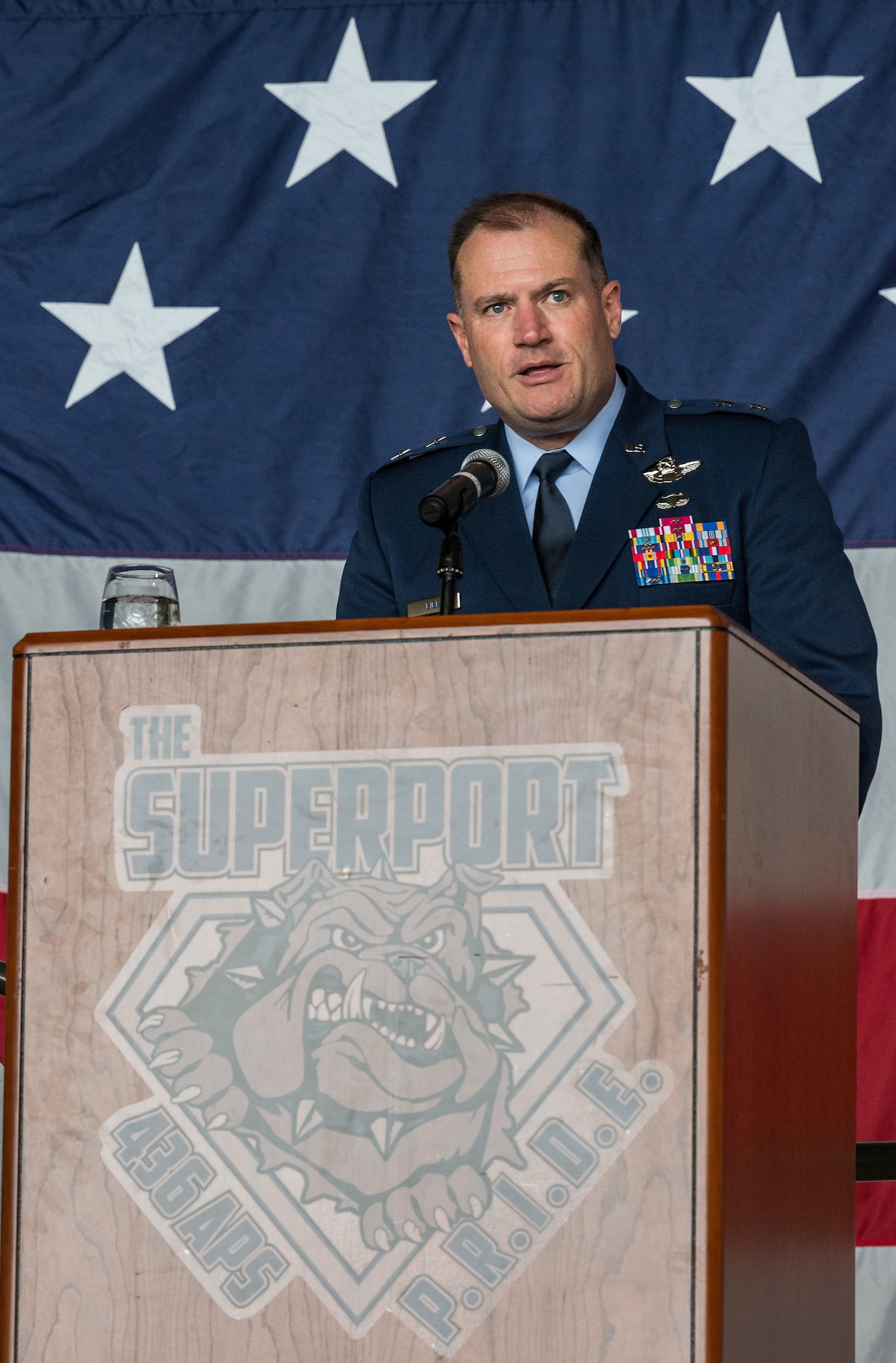 Maj. Gen. Thad Bibb, 18th Air Force commander, speaks to Team Dover members, friends and family, guests, civic leaders and congressional delegates during the 436th Airlift Wing Assumption of Command ceremony on Dover Air Force Base, Delaware, June 4, 2021. Bibb presided over the ceremony in which Col. Matthew Husemann assumed command of the Eagle Wing. (U.S. Air Force photo by Roland Balik)