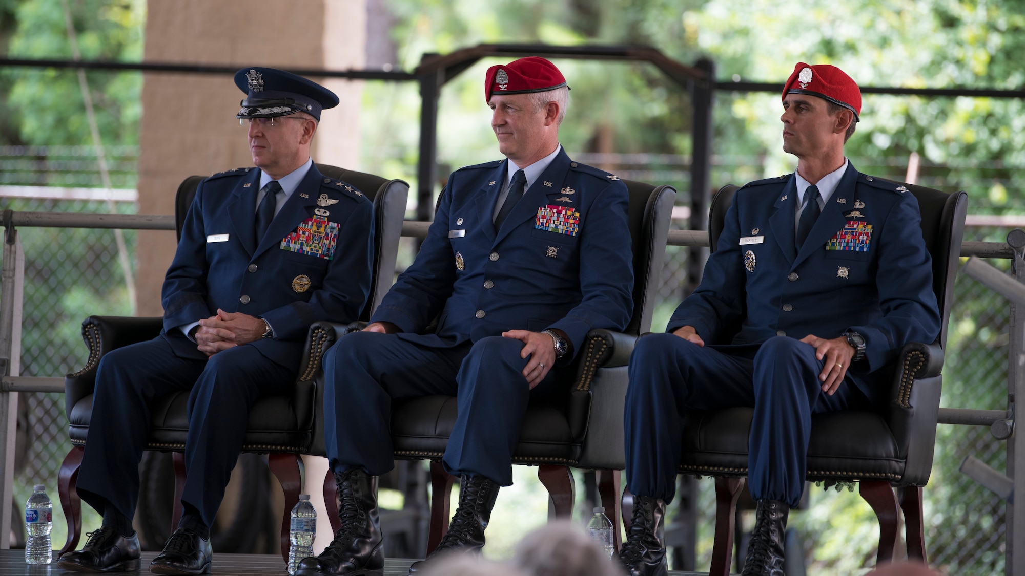 U.S. Air Force Lt. Gen. Jim Slife, left, commander of Air Force Special Operations Command, U.S. Air Force Col. Matthew Allen, center, outgoing commander of the 24th Special Operations Wing, and U.S. Air Force Col. Jason Daniels, incoming commander of the 24th SOW, participate in a change of command ceremony at Hurlburt Field, Florida, June 4, 2021.