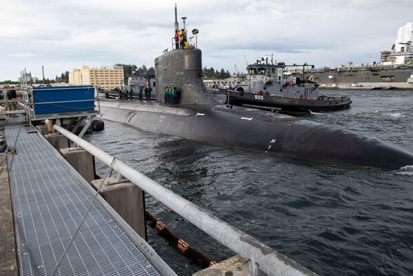 The Seawolf-class fast-attack submarine USS Connecticut (SSN 22) departs Naval Base Kistap-Bremerton for deployment.