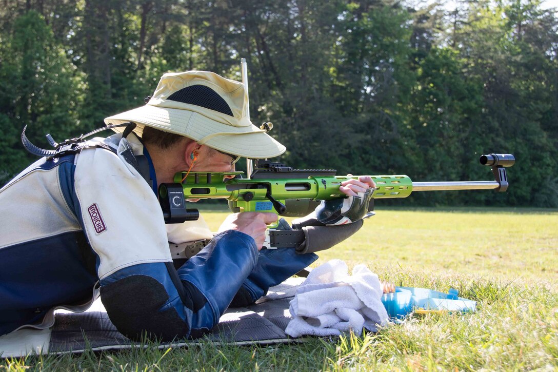 Office of Special Investigations Special Agent Robert Davis focuses down range during the 59th Annual Atlantic Fleet and All Navy (East) Rifle and Pistol Championships at Marine Corps Base Quantico, Va., May 15-22, 2021. SA Davis has been an Air Force Shooting Team member since 2002 with an international rifle discipline. (Photo by SA Sean Foster)