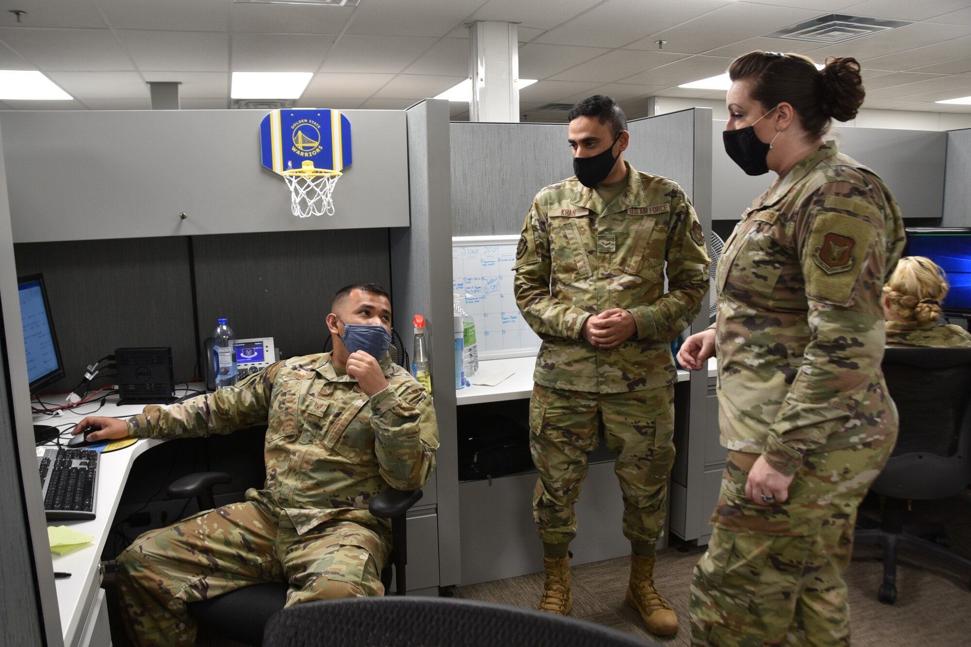 (right) 301st Fighter Wing Force Support Squadron and Wing Support Agency First Sergeant, Master Sgt. Cassandra Hernandez engages with FSS career development technicians, (left) Staff Sgt. Jose Pena and Airman First Class (center) Anwar Khan at U.S. Naval Air Station Joint Reserve Base Fort Worth, Texas on June 5th, 2021. Master Sgt. Hernandez, who has an open door policy, joined the 301 FW from the 44th Fighter Group, the wing's classic associate unit located at Eglin Air Force Base, Fla. (U.S. Air Force photo by Senior Airman William Downs)