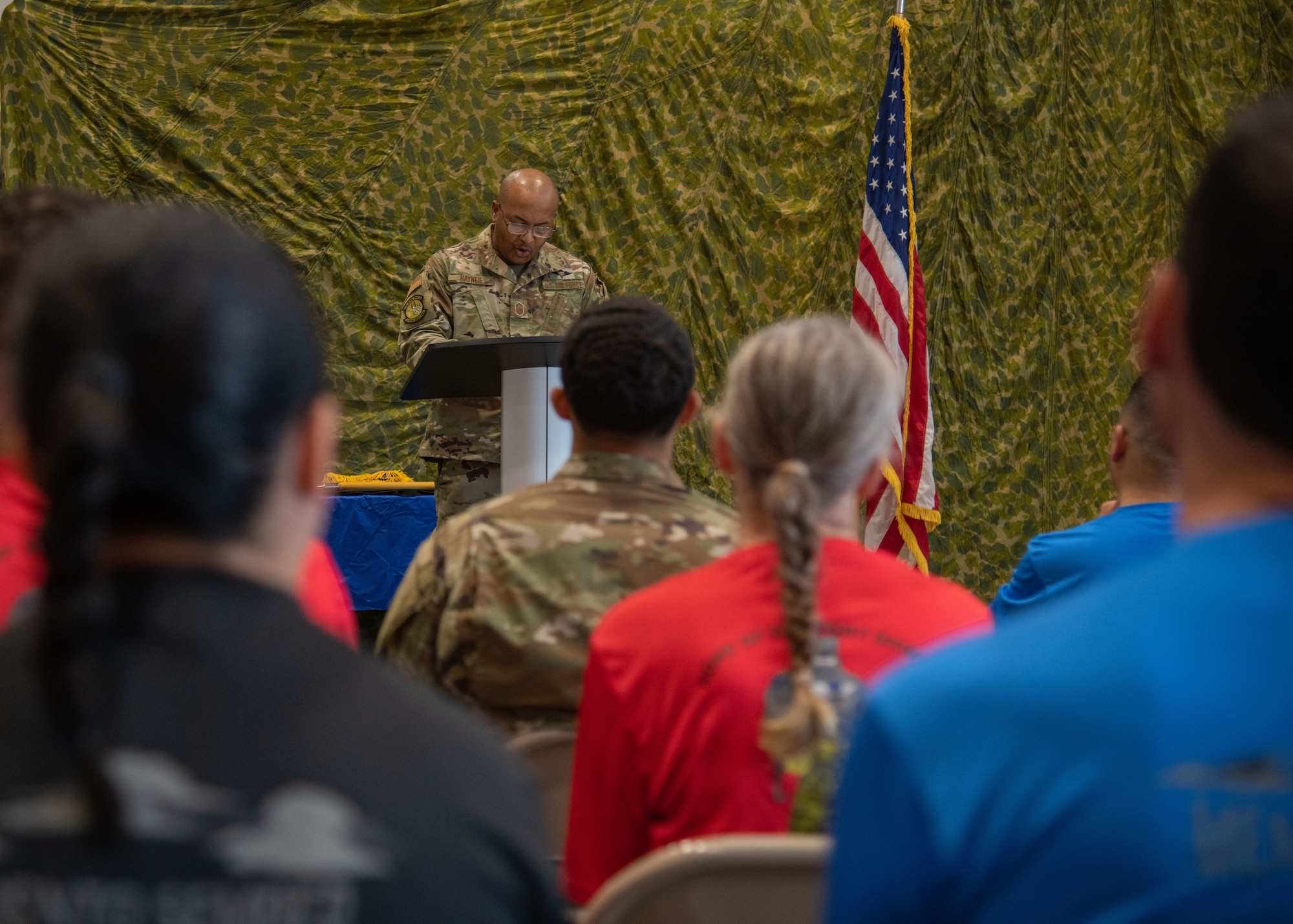 Senior Master Sgt. Edrick Haynes of the 41st Aerial Port Squadron at Keesler Air Force Base, Miss., makes opening remarks during the squadron’s first ever “Port Dawg Memorial Run” June 5, 2021. The air transportation community as a whole has held memorial runs for fallen members every year since 2013. (U.S. Air Force Photo by Staff Sgt. Kristen Pittman)
