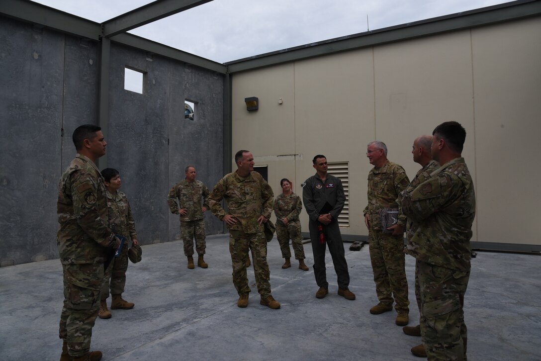 Maj. Gen. John Healy, 22nd Air Force commander, and Chief Master Sgt. Imelda Johnson, 22nd AF command chief master sergeant, toured the 403rd Fabrication Flight's new construction site of the decontamination building during their visit to the 403rd Wing, June 4-5, 2021. The visit coincided with the 403rd Wing's change of command, in which Healy presided over the ceremony where Col. Stuart M. Rubio took command from Col. Jeffrey A. Van Dootingh, June 5. (U.S. Air Force photo by Jessica L. Kendziorek)