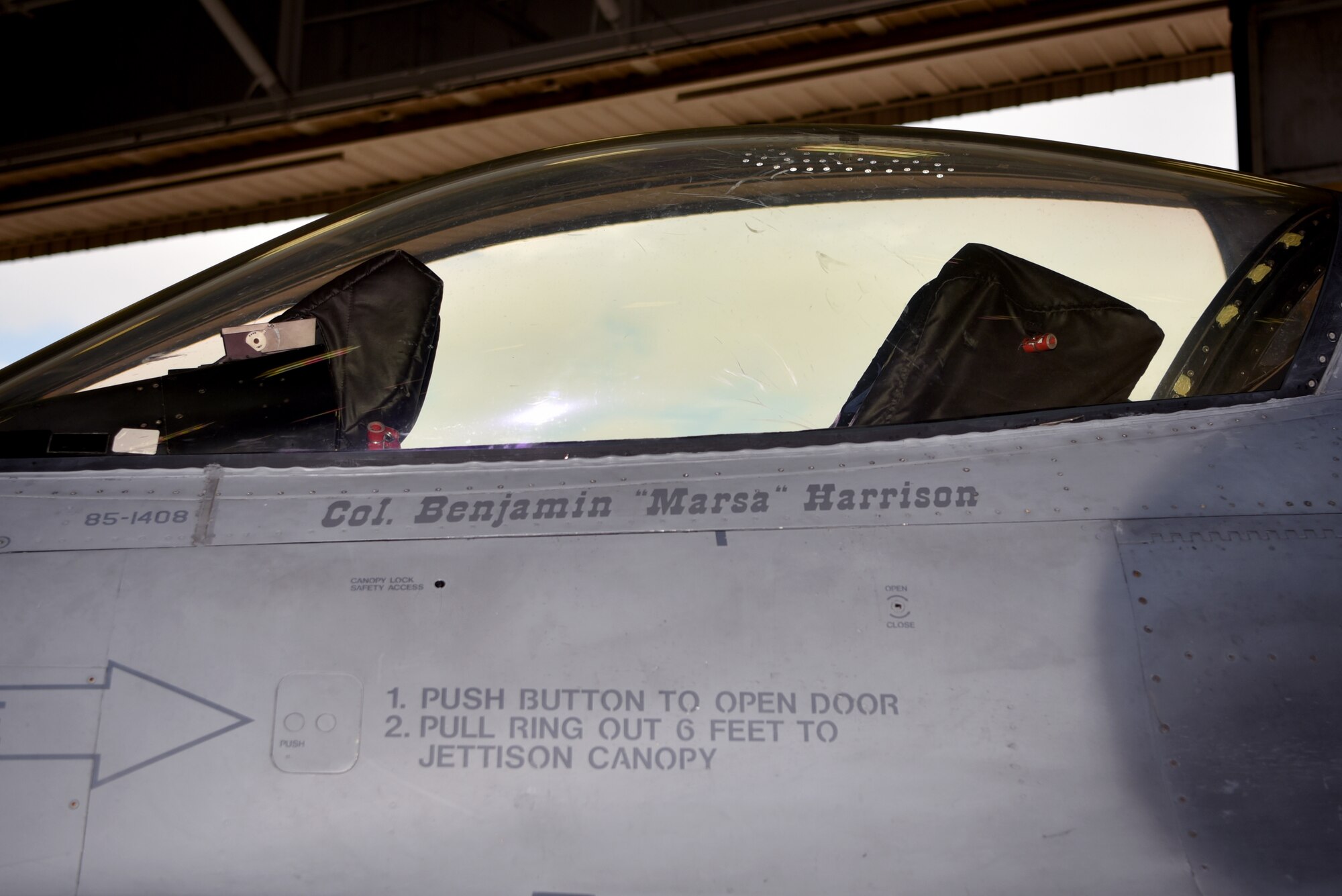 Col. Benjamin “Marsa” Harrison’s, 301st Operations Group commander, name is revealed on an F-16 Fighting Falcon as part of his 301 FW OG change of command ceremony, June 6, 2021, at U.S. Naval Air Station Joint Reserve Base Fort Worth, Texas. Harrison is responsible for the operational aspects and combat deployment of F-16 Fighting Falcon in support of combat commanders and theaters worldwide. (U.S. Air Force photo by Staff Sgt. Randall Moose)