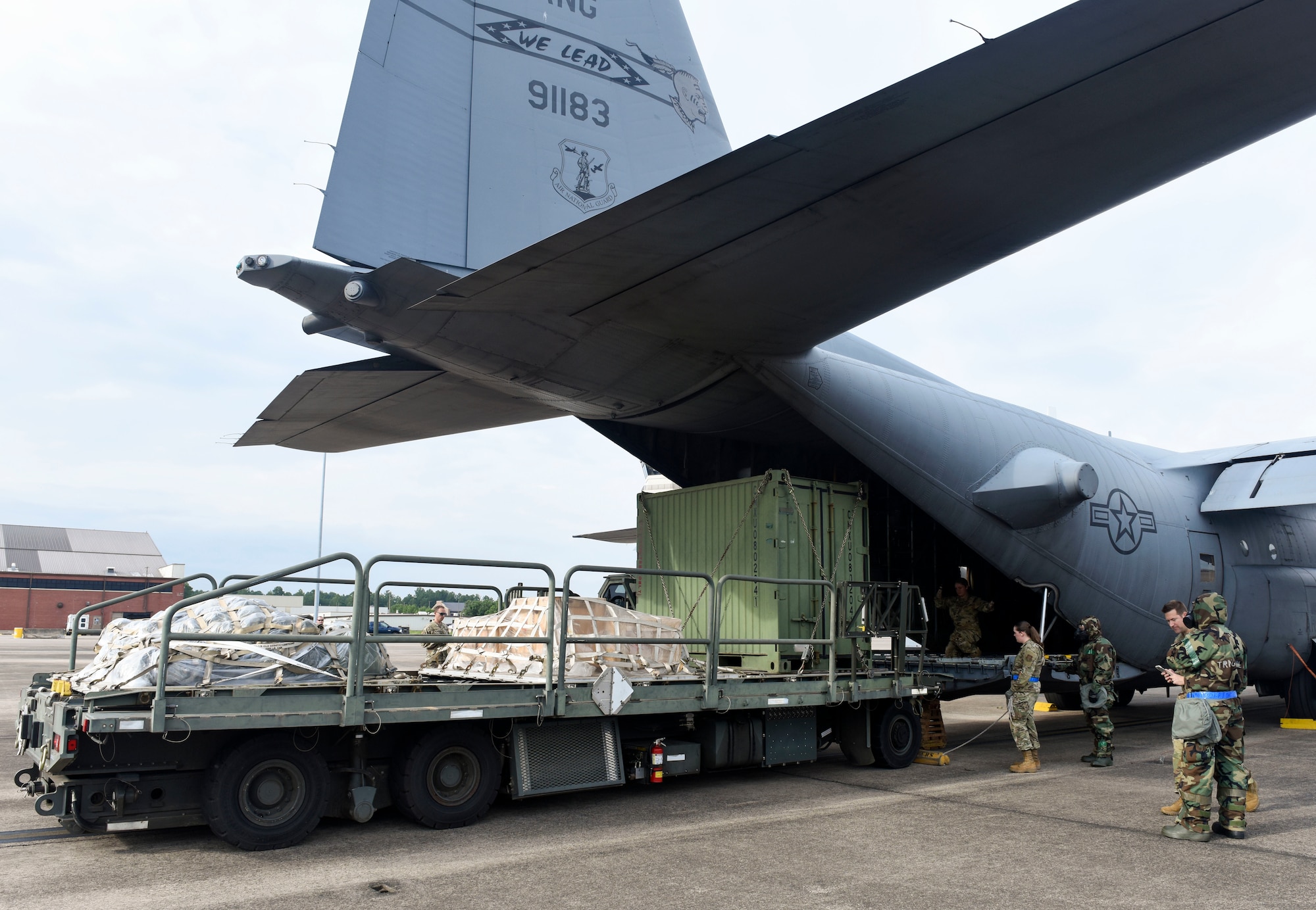 ‘Port Dawgs’ from the 189th Aerial Port Flight, Air National Guard, and from the 96th Aerial Port Squadron, Air Force Reserve, carefully load cargo onto a C-130H Hercules aircraft on June 5, 2021 at Little Rock Air Force Base, Arkansas. The total force team created training focused on a realistic deployment centered, aerial port operations. (U.S. Air Force photo by Tech. Sgt. James Phillips)