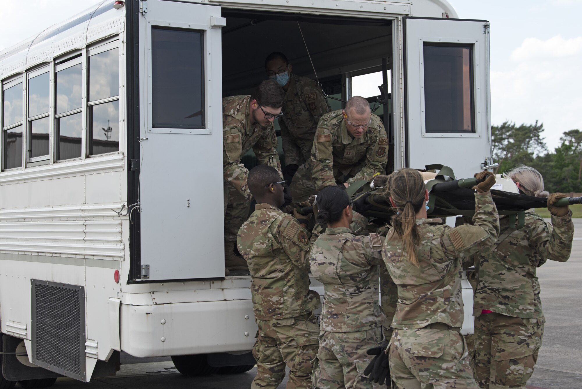 Airmen from the 52nd Medical Group, Spangdahlem Air Base, Germany, participate in an En-Route Patient Staging System (ERPSS) training scenario involving simulated patients during Saber Guardian 21 at Ramstein Air Base, Germany, June 2, 2021. The multinational exercise happens every two years and consists of field training and live fire exercises.