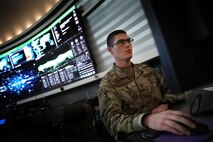 A U.S. Cyber Command member works in the Integrated Intelligence Center, Joint Operations Center at Fort George G. Meade, Md., April. 2, 2021.