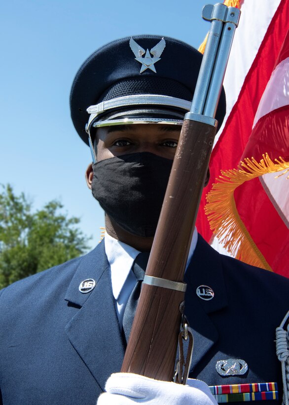 Honor guard member holds the position of port arms during a colors ceremony formation at Tyndall Air Force Base, Florida, April 19, 2021.