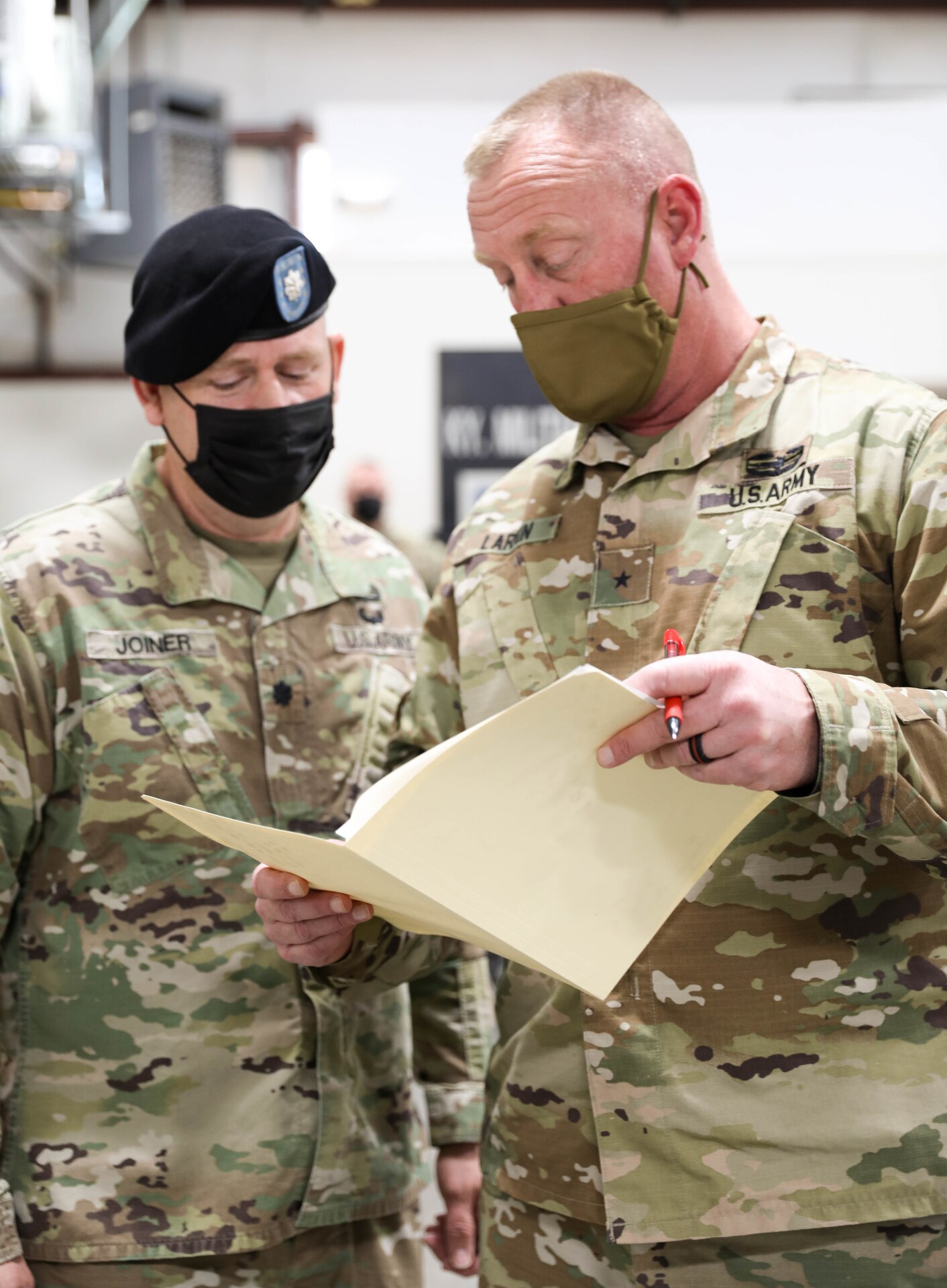 Lt. Col. Allen Joiner and Brig. Gen. Robert J. Larkin, Deputy Adjutant General, Kentucky National Guard review statements
