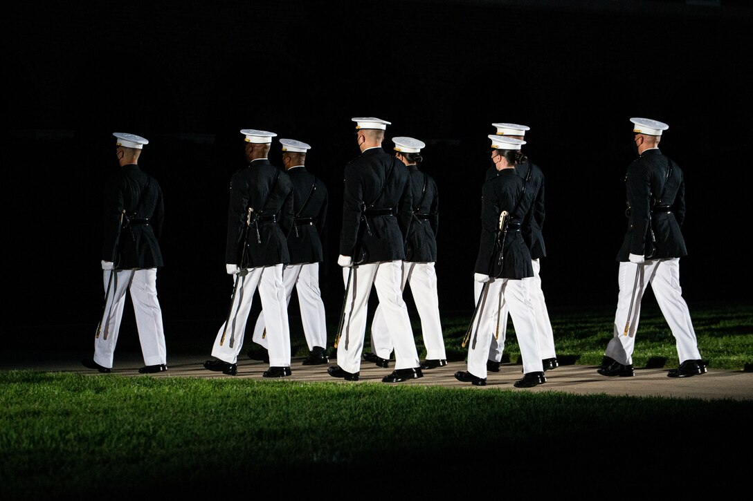 Officers with Alpha and Bravo Companies march up Center Walk for “Officer’s Call” during the Friday Evening Parade at Marine Barracks Washington, June 4, 2021.