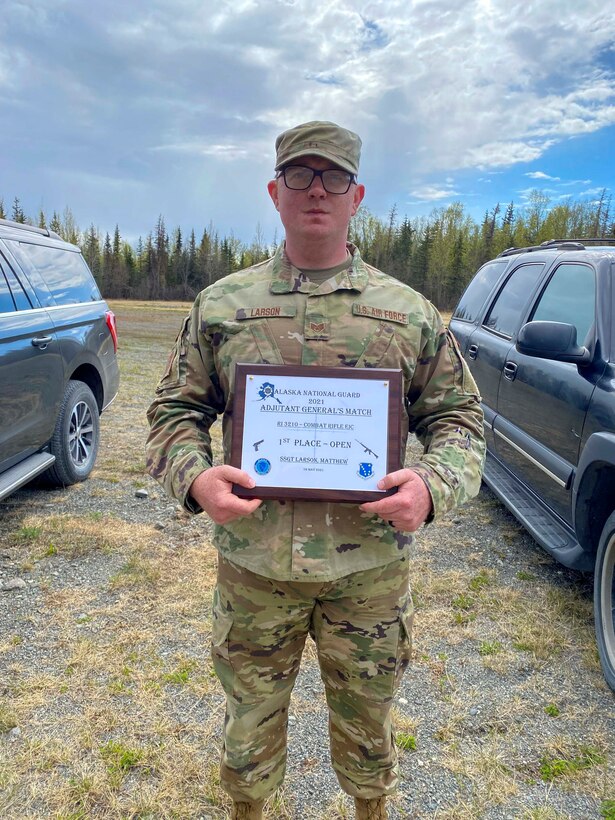 Alaska Air National Guard Staff Sgt. Matthew Larson, a security forces member with the 268th Security Forces Squadron, poses for a photo after the annual Adjutant General Match, May 16, 2021. Larson took first place in the open rifle marksmanship competition, was added to the state team to compete in the regional competition, and was awarded the Governor's Twenty tab, which is generally awarded to the top 20 marksmen in the state. (Courtesy photo)