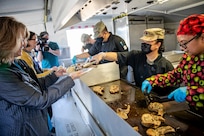 Representatives from local businesses participate in the Alaska Army National Guard’s Culinary Showcase, an event celebrating the launch of the new Partnership for Youth Success (PaYS) program on Joint Base Elmendorf-Richardson, May 14. The PaYS program is a strategic partnership between the Army National Guard and a cross section of private businesses, universities, and public institutions. It provides Alaska’s newest Citizen-Soldiers the opportunity to increase their prospects for potential civilian employment while serving their country. (U.S. Army National Guard photo by Edward Eagerton)