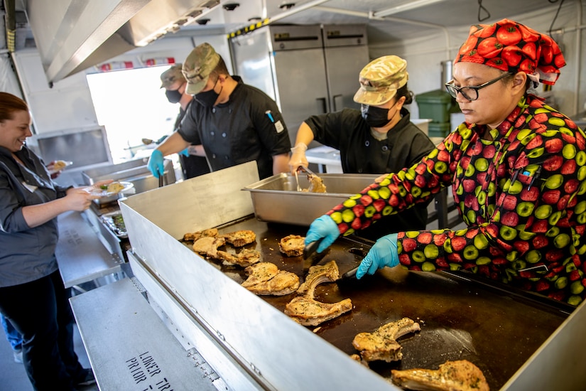 Representatives from local businesses participate in the Alaska Army National Guard’s Culinary Showcase, an event celebrating the launch of the new Partnership for Youth Success (PaYS) program on Joint Base Elmendorf-Richardson, May 14. The PaYS program is a strategic partnership between the Army National Guard and a cross section of private businesses, universities, and public institutions. It provides Alaska’s newest Citizen-Soldiers the opportunity to increase their prospects for potential civilian employment while serving their country. (U.S. Army National Guard photo by Edward Eagerton)