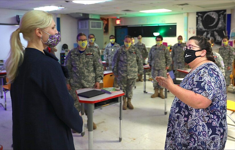 Britainy Beshear, first lady of Kentucky, speaks to teachers and students at the Bluegrass ChalleNGe Academy