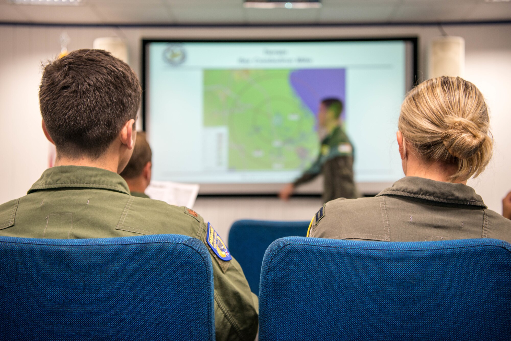 Airmen attend briefing