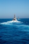 210602-A-MU580-1136 ARABIAN GULF (June 2, 2021) - Patrol boat USCGC Adak (WPB 1304), left, and patrol coastal ship USS Tempest (PC 2) operate in formation during an air operations in support of maritime surface warfare (AOMSW) exercise in the Arabian Gulf, June 2. Adak and Tempest are deployed to the U.S. 5th Fleet area of operations in support of naval operations to ensure maritime stability and security in the Central Region connecting the Mediterranean and Pacific through the western Indian Ocean and three critical choke points to the free flow of global commerce. (U.S. Army photo by Spc. Zion Thomas)