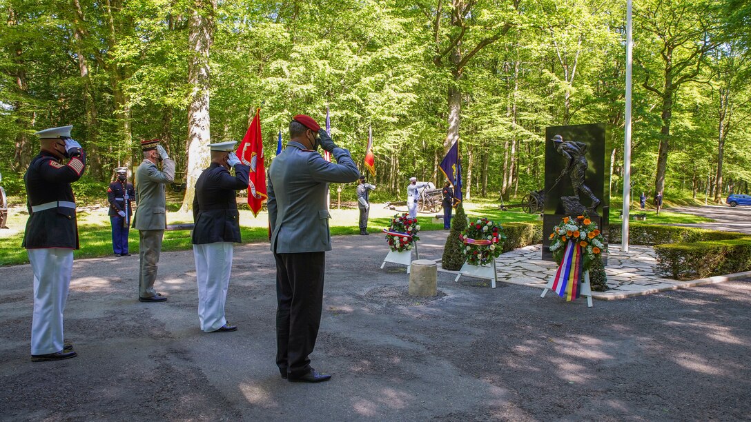 U.S. Marine Corps Forces Europe and Africa Commander and Sergeant Major, and French and German General officers, participate in a ceremony at the Iron Mike statue near Belleau, France, May 30, 2021. The ceremony was held Memorial Day weekend in commemoration of the 103rd anniversary of the battle of Belleau Wood, conducted to honor the legacy of service members who gave their lives in defense of the United States and European allies. (U.S. Marine Corps photo by Staff Sgt. Brytani Musick)