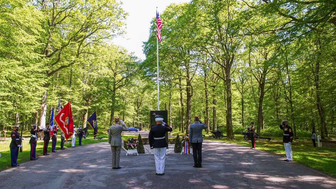 U.S. Marine Corps Forces Europe and Africa Commander and Sergeant Major, and French and German General officers, participate in a ceremony at the Iron Mike statue near Belleau, France, May 30, 2021. The ceremony was held Memorial Day weekend in commemoration of the 103rd anniversary of the battle of Belleau Wood, conducted to honor the legacy of service members who gave their lives in defense of the United States and European allies. (U.S. Marine Corps photo by Staff Sgt. Brytani Musick)