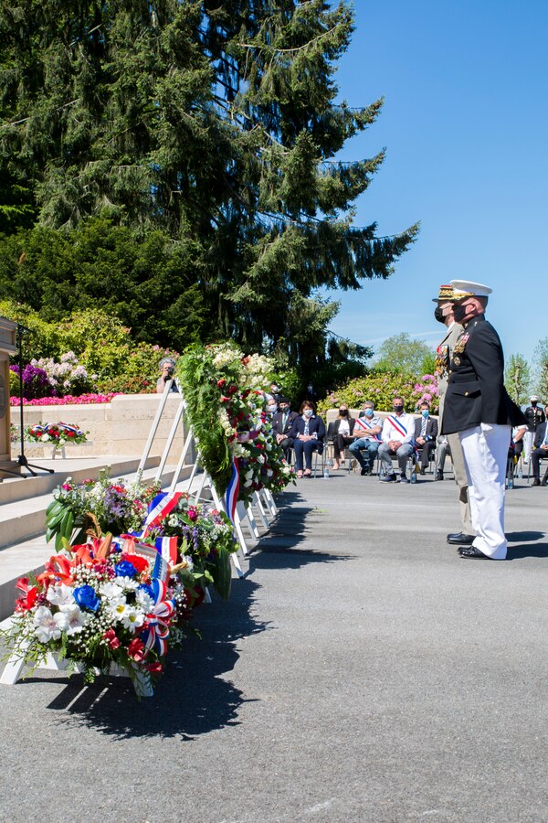Maj. Gen. Tracy W. King, Marine Forces Europe and Africa commander, and a French General pause for a moment of silence during a ceremony at Aisne-Marne American Cemetery in Belleau, France, May 30, 2021. The ceremony was held Memorial Day weekend in commemoration of the 103rd anniversary of the battle of Belleau Wood, conducted to honor the legacy of service members who gave their lives in defense of the United States and European allies. U.S. Marines and Sailors from Marine Corps Forces Europe and Africa, 5th Marine Regiment, 6th Marine Regiment, 1st Marine Division band, U.S. Soldiers from the Army 26th Infantry Division, 2nd Infantry Division representatives, German and French service members, and local officials participated in the ceremony. The joint color guard included the U.S. Army colors, a first for the historic ceremony. This was the first time since the battle over a century ago that U.S. Marine Corps, U.S. Army, U.S. Navy, French, and German service members were all present for the ceremonies. (U.S. Marine Corps photo by Staff Sgt. Brytani Musick)