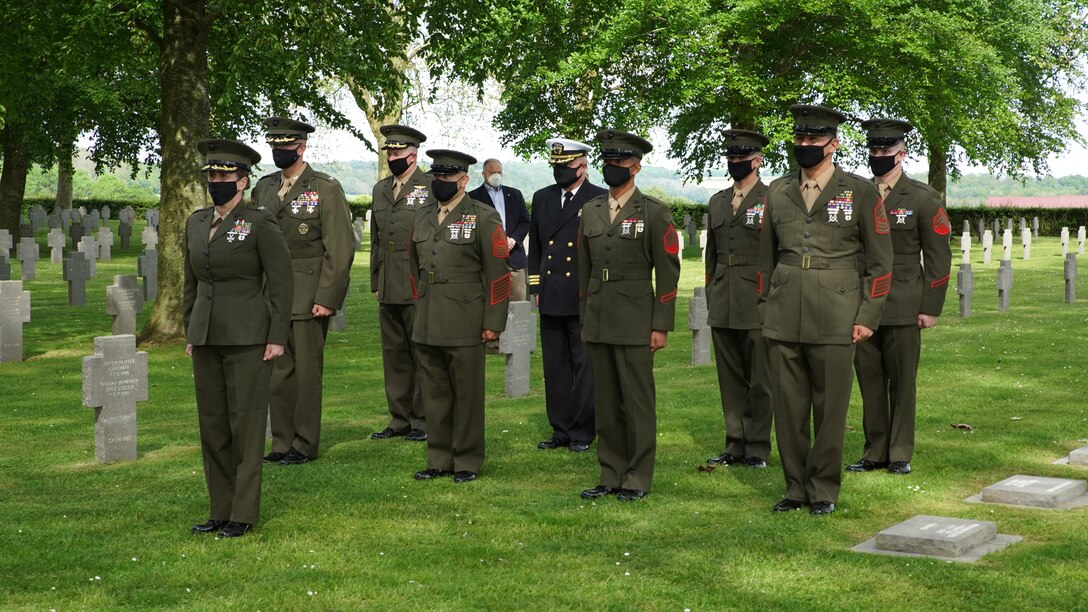 Maj. Gen. Tracy W. King, Marine Forces Europe and Africa commander, and Brig. Gen. Michael Podzus, German Army, salute wreaths laid in honor of the German service members killed during World War I, during an event at the German cemetery near Belleau, France, May 29, 2021. U.S. Marines are in France to commemorate the 103rd anniversary of the battle of Belleau Wood during a Memorial Day service at the local American cemeteries. (U.S. Marine Corps photo by Staff Sgt. Brytani Musick)