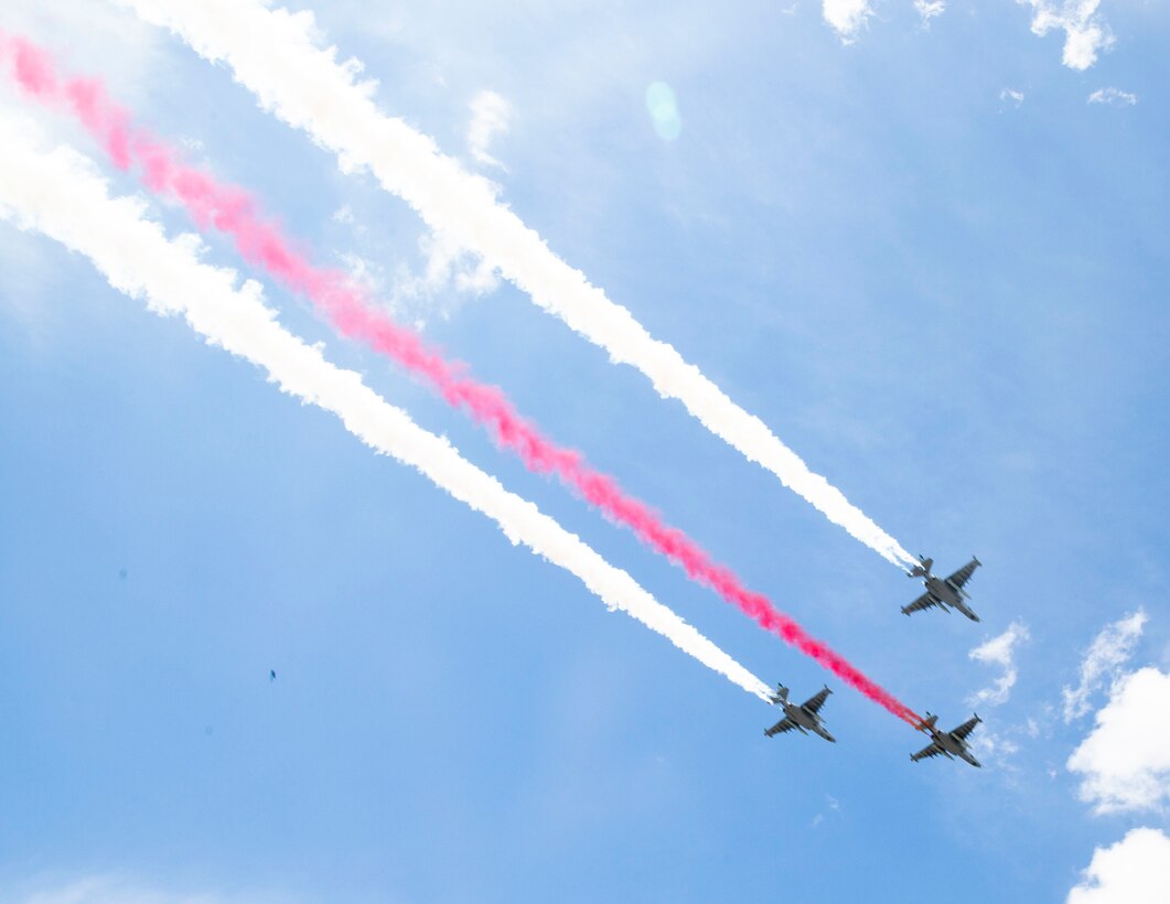 Georgian Defence Forces pilots leave contrails of red and white during the ceremony for the Georgian Independence Day celebration at Freedom Square in Tbilisi, Georgia, on May 26, 2021. On this day, Georgia celebrates the adoption of the Act of Independence, which established the Democratic Republic of Georgia in 1918. This is also the country’s 30th year as a free and independent nation since its separation from the former Soviet Union. U.S. Marines and Soldiers were the only foreign servicemembers invited to participate together with the troops of the Georgian Defence Forces during the celebration. The Marines currently deployed to Georgia represent the final GDP rotation before the mission is sunset in the fall of this year due to the decision for U.S. troops to leave Afghanistan. For the past 17 years, U.S. Marines and Georgian troops have trained and deployed together, even fighting side-by-side, in support of various missions in the Middle East. (U.S. Marine Corps photo by Sgt. Kirstin Spanu)