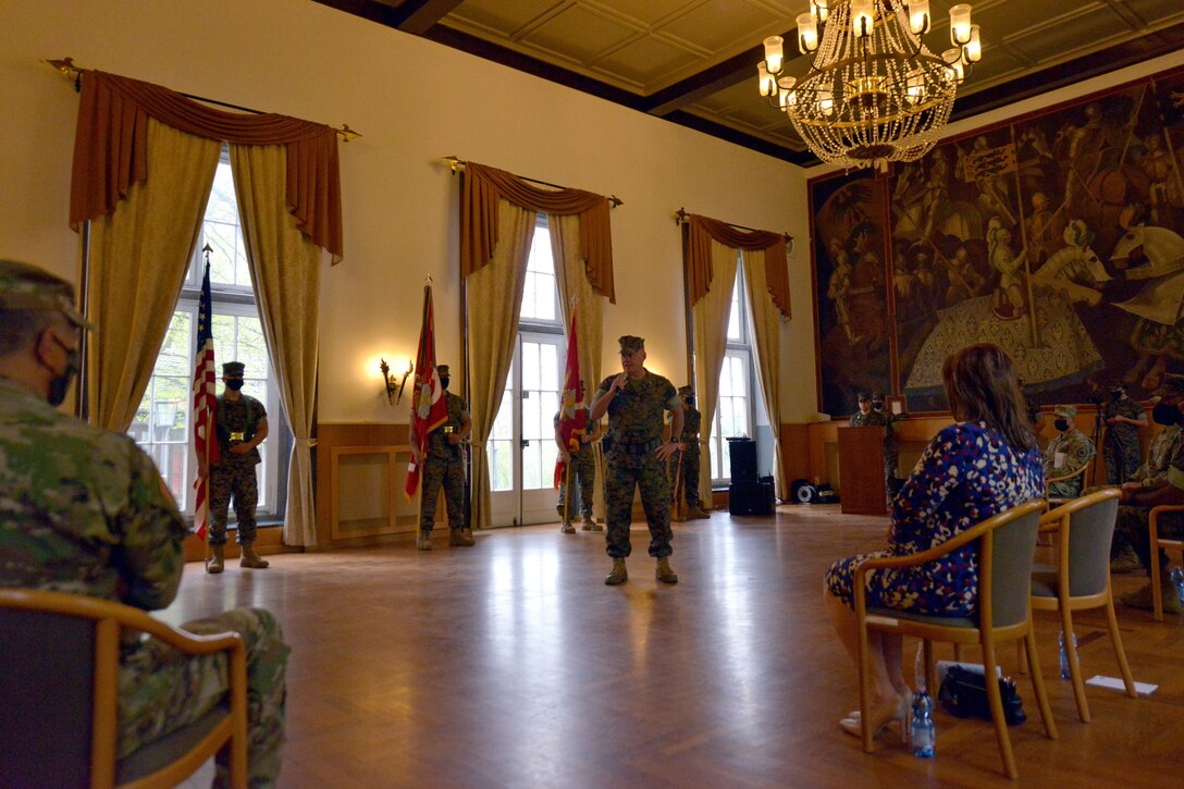 Maj. Gen.Tracy W. King, incoming commander of U.S. Marine Corps Forces, Europe and Africa (MARFOREUR/AF), addresses the command during his speech as incoming commander during the MARFOREUR/AF change of command ceremony at the U.S. Army Garrison Stuttgart firehouse in Boeblingen, Germany, May 6, 2021. This ceremony recognizes the significance of the passage of command, honors the accomplishments of the organization under the outgoing commander, and formally appoints the incoming commander. (U.S. Army Photo by Jason Johnston)