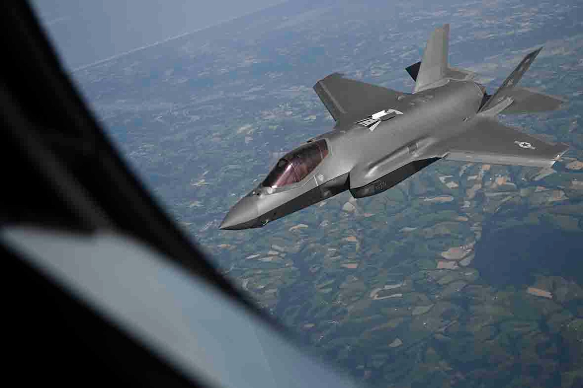 A U.S. Air Force F-35A Lightning II aircraft assigned to the 4th Fighter Squadron, Hill Air Force Base, Utah, departs from a KC-135 Stratotanker aircraft assigned to the 100th Air Refueling Wing, Royal Air Force Mildenhall, England, after receiving fuel over France during exercise Atlantic Trident, May 26, 2021. Our forward-deployed forces are engaged, postured and ready with credible force to assure, deter and defend in an increasingly complex security environment. (U.S. Air Force photo by Senior Airman Joseph Barron)