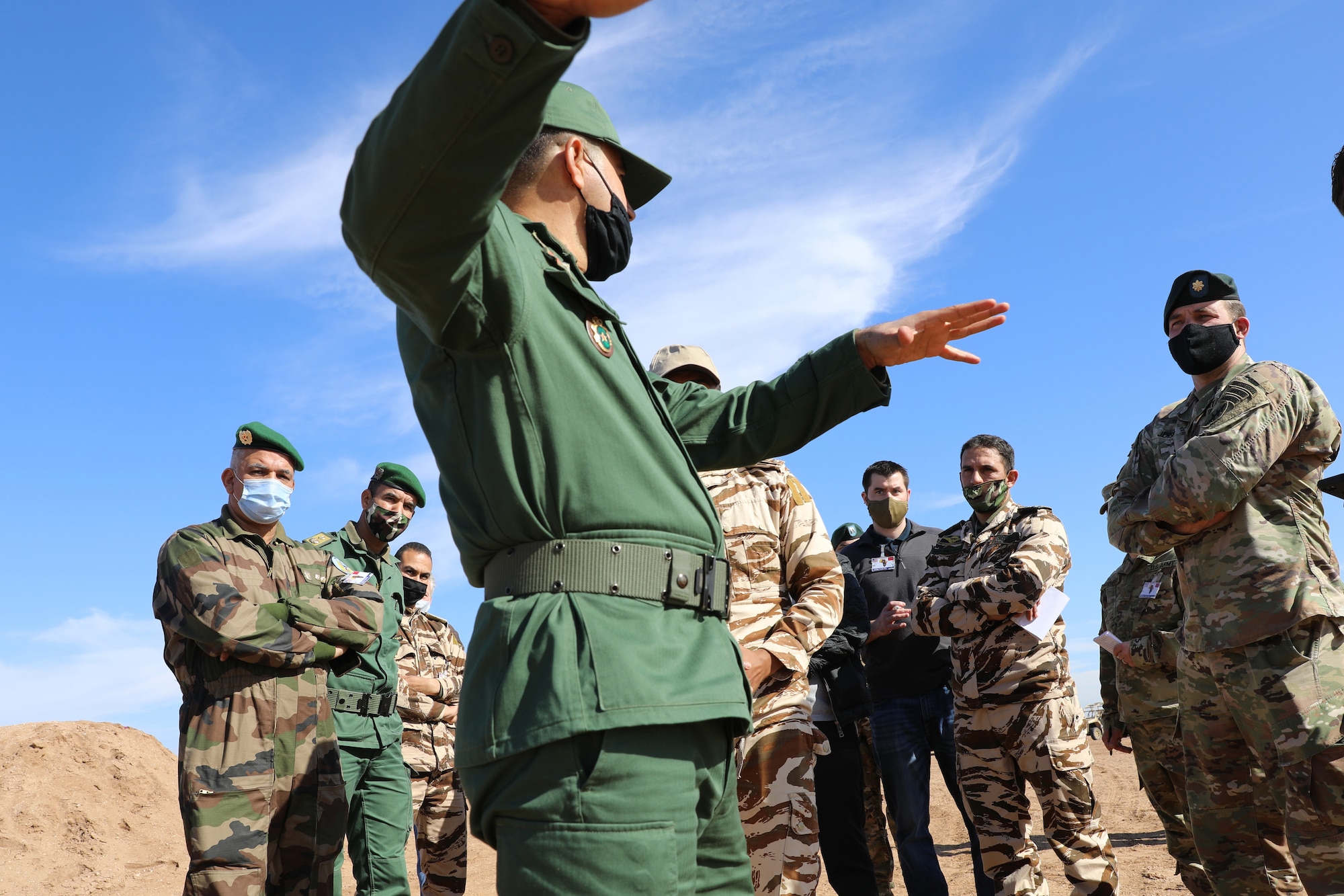 A Royal Morocco Armed Forces officer explains the capabilities of a firing range March 20 during a site survey for exercise African Lion 21, scheduled for June. African Lion, U.S. Africa Command's largest exercise, has increased interoperability among U.S. partners and Allies since 2003. Plans for AL21 involve more than 10,000 troops from the United States, Morocco, Tunisia, Senegal and elsewhere. The global COVID-19 pandemic curtailed the previous year's exercise. Plans for AL21 include COVID-19 mitigations and flexible options to ensure maximum participation and value for participating countries. (U.S. Army photo by Maj. Cain S. Claxton/Southern European Task Force, Africa)