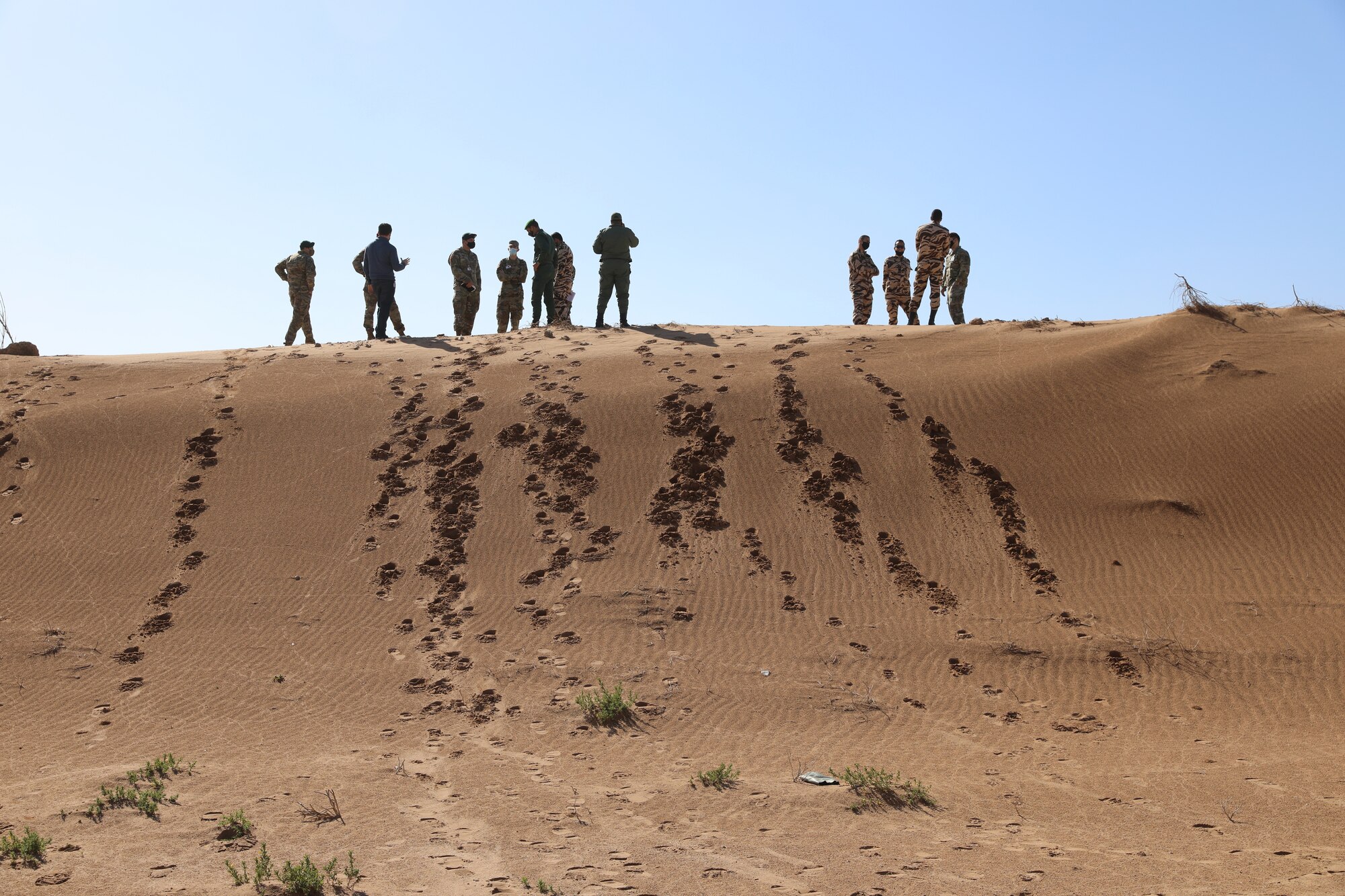 Planners for exercise African Lion 21 suvery a small arms weapons range during a visit to Morocco Jan. 20, 2021. Scheduled for June, African Lion, U.S. Africa Command's largest exercise, has increased interoperability among U.S. partners and Allies since 2003. Plans for AL21 involve more than 10,000 troops from the United States, Morocco, Tunisia, Senegal and elsewhere. The global COVID-19 pandemic curtailed the previous year's exercise. Plans for AL21 include COVID-19 mitigations and flexible options to ensure maximum participation and value for participating countries. (U.S. Army photo by Maj. Cain S. Claxton/Southern European Task Force, Africa)