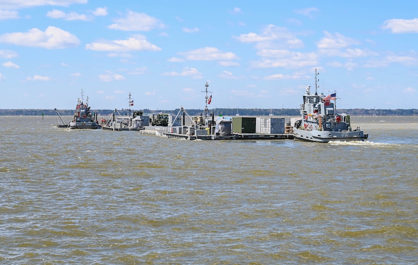 U.S. Soldiers from the 7th Transportation Brigade (Expeditionary), depart 3rd Port, Joint Base Langley-Eustis, Virginia, April 2, 2021. The barge was loaded and shipped to Naval Station Norfolk with supplies and equipment for an upcoming deployment. (U.S. Air Force photo by Senior Airman Sarah Dowe)