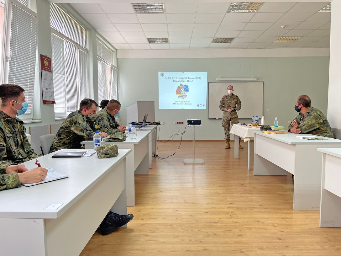 U.S. Army Reserve Lt. Col. Mary J. Durham, commander of the 773rd Civil Support Team, 7th Mission Support Command, briefs chemical, biological, radiological, nuclear reaction capabilities to Soldiers from the Bulgarian Army's 38th CBRN Defence Battalion during a military-to-military exchange held in Sofia, Bulgaria, May 25-28, 2021. The event was designed to enhance relationships and interoperability with Allies and partner nations. (U.S. Army Reserve photo by Staff Sgt. Rosannie Murillo, 773rd CST)