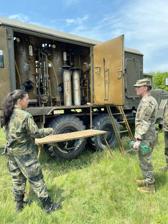 U.S. Army Reserve Lt. Col. Mary J. Durham, commander of the 773rd Civil Support Team, 7th Mission Support Command, right, receives a brief from Bulgarian Army 1st Lt. Polina Dimova, a chemical, biological, radiological, nuclear platoon commander with the 38th CBRN Defence Battalion, during a military-to-military exchange held in Sofia, Bulgaria, May 25-28, 2021. The event was designed to enhance relationships and interoperability with Allies and partner nations. (U.S. Army Reserve photo by Staff Sgt. Christopher Branning, 773rd CST)