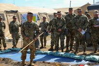 U.S. Army Reserve Lt. Col. Jung Lee, current operations Chief for the 358th Civil Affairs Brigade, and assigned to the role of tactical Information Operations planner for Command Post Exercise – Functional (CPX-F) 21-02 at Ft. McCoy, Wis., briefs the coordinated messaging of the operation during the rehearsal of concept drill on June 5, 2021. Nested messages and cooperation across the Civil Affairs, PsyOp and Public Affairs units assigned to the exercise allow Soldiers to bring together different skill sets from the Army Reserve and have them work together toward a common goal of mission success.