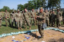 U.S. Army Reserve Maj. Richard Flores, 358th Civil Affairs Brigade, prepares to brief the Rehearsal of Concept drill for the Command Post Exercise – Functional (CPX-F) 21-02, June 5, 2021, at Ft. McCoy, Wis. The CPX-F is designed to bring together different skill sets from across the command and have them work together toward a common goal in support of the U.S. Army Reserve mission as a globally responsive force.