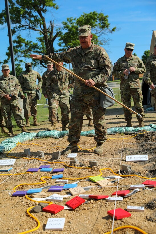 Clearly labeled units, cities, routes and terrain features help clearly define battle phases during the Command Post Exercise – Functional (CPX-F) 21-02 Rehearsal of Concept drill at Ft. McCoy, Wis., June 5, 2021. Units from across U.S. Army Civil Affairs and Psychological Operations Command (Airborne) are working together at Ft. McCoy to improve readiness and staff interoperability in support of the U.S. Army Reserve’s mission of a globally responsive force ready to deploy at a moment's notice.