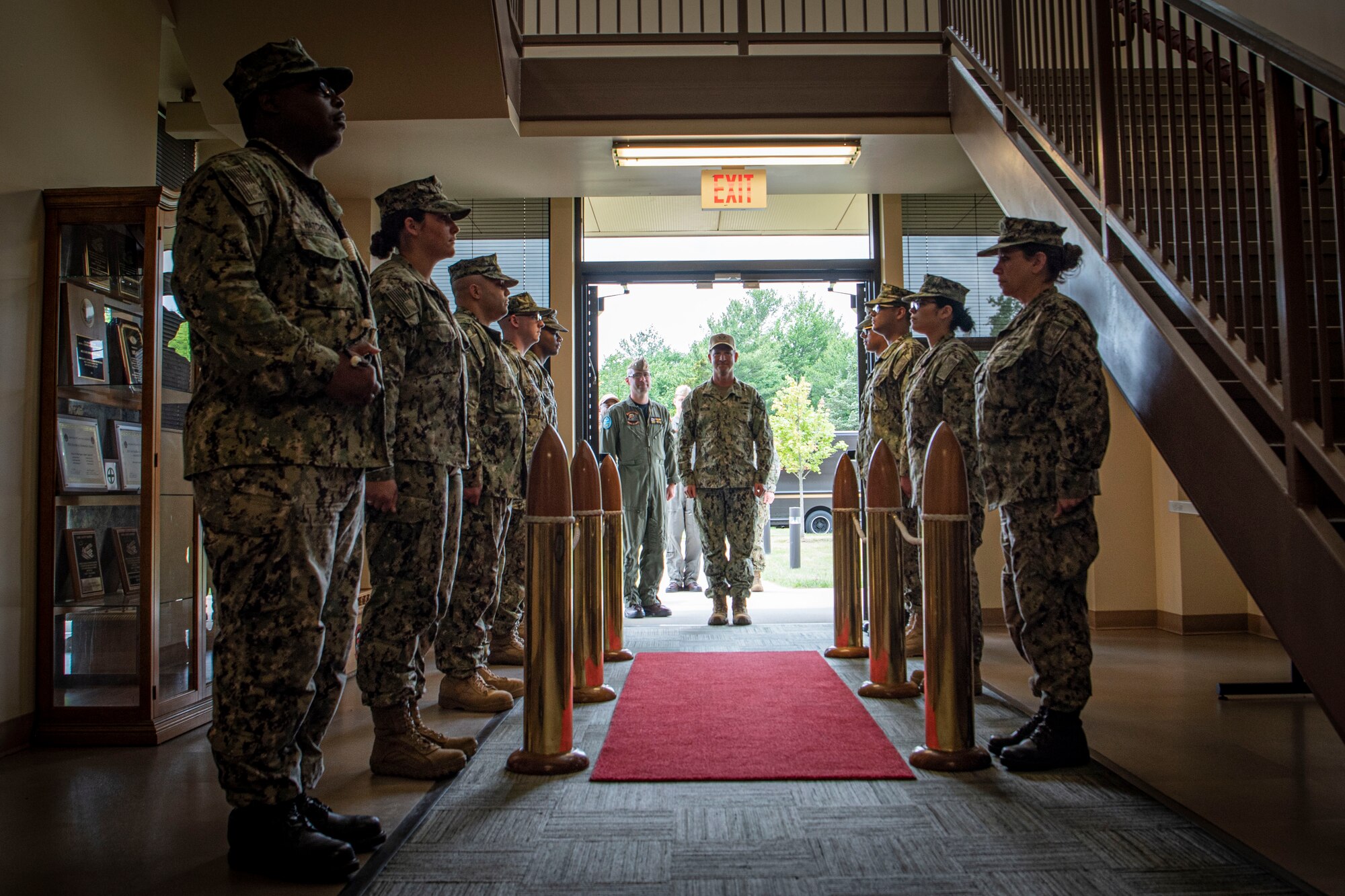 Photo of a sailor arriving at JB MDL.