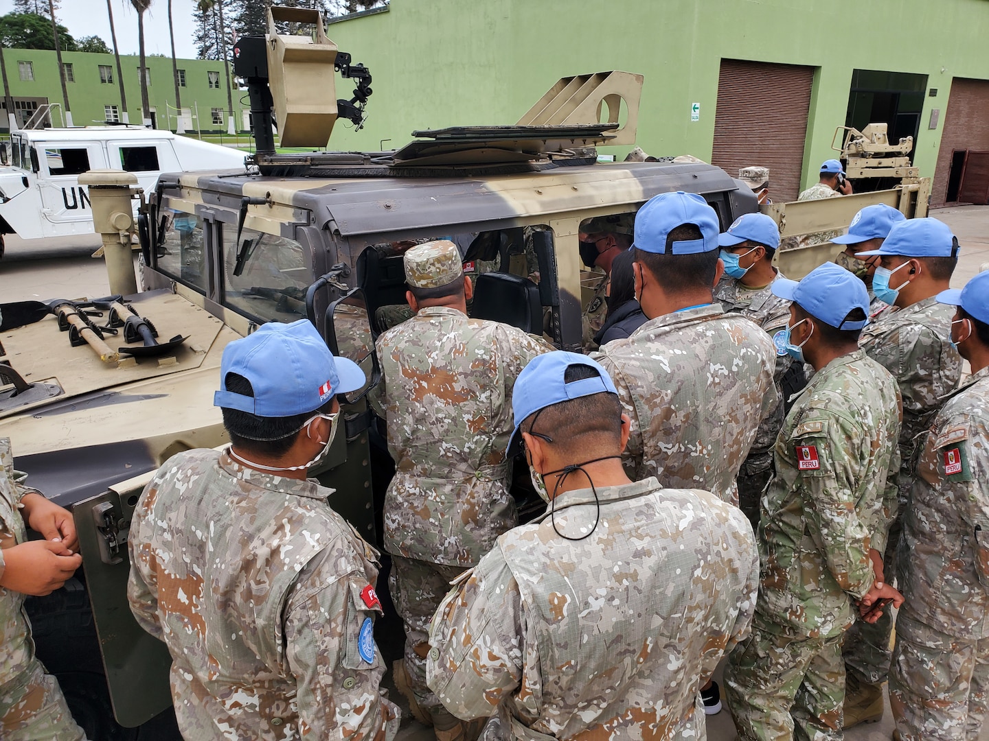 Members of the West Virginia National Guard provide Mechanics Mobile Training Team, Preventative Maintenance Checks and Services, and Driver’s Training to members of the Peruvian Armed Forces on the M1165 HMMWV (High Mobility Multipurpose Wheeled Vehicle), as a part of the National Guard's State Partnership Program in Lima, Peru, June 3, 2021. Peru will utilize the training on international peacekeeping missions as part of the United Nations Multidimensional Integrated Stabilization Mission in the Central African Republic, conducting missions as diverse as clearing terrain, airfield and heliport construction, equipment transportation and convoy operations including food and water supplies, communications, intelligence, as well as legal and medical operations. (Courtesy photo)