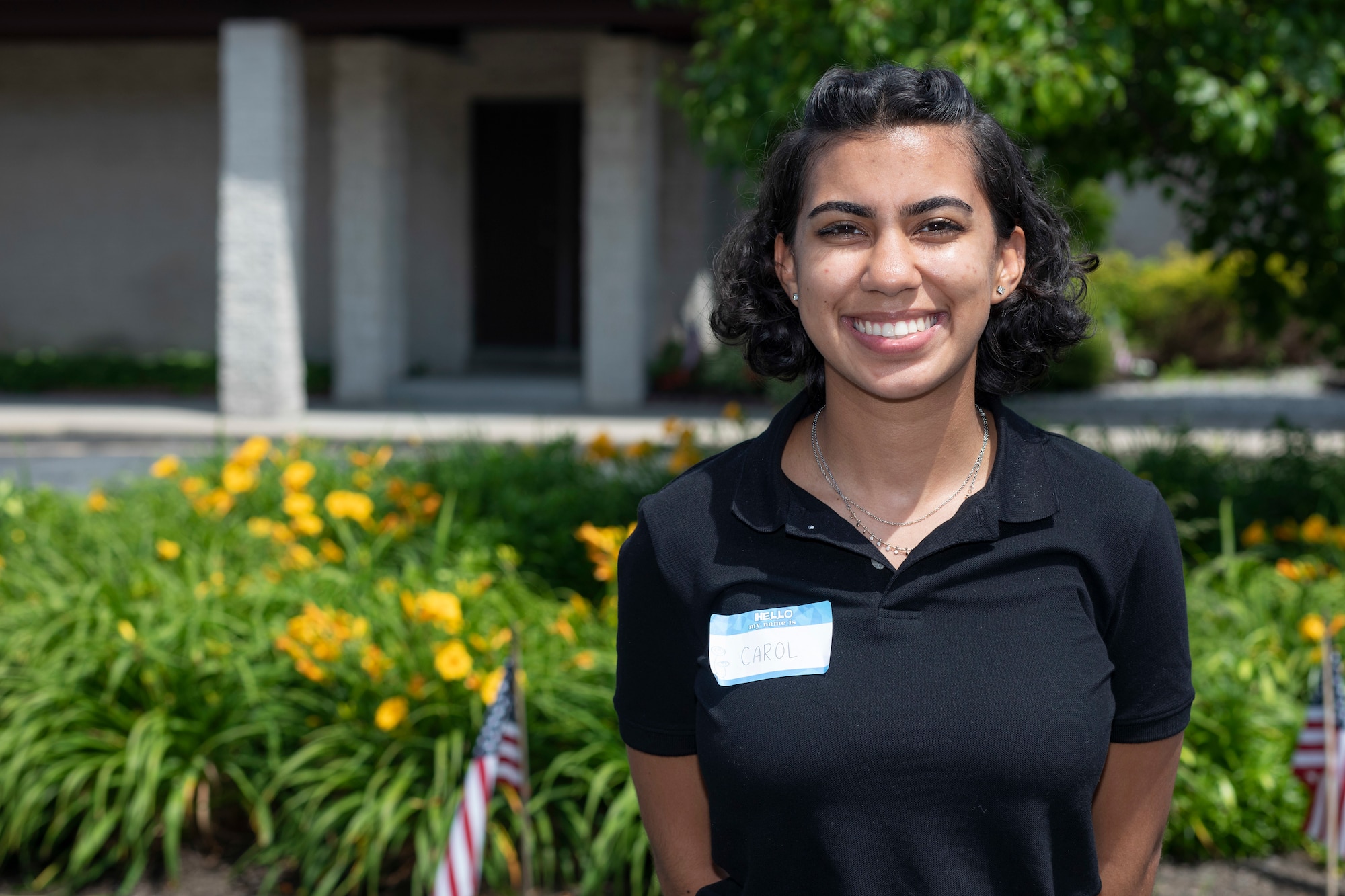 U.S. Air Force Airman 1st Class Carol Martinez, a public health specialist with the 177th Medical Group, stands for a portrait outside a polling site in Absecon, N.J., June 8, 2021.