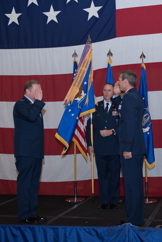 Maj. Gen. Radliff renders a salute to Lt. Gen. Richard Scobee to finalize the assumption of command.