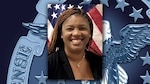 Head and shoulders picture of a Black woman in black shirt in front of the US flag.