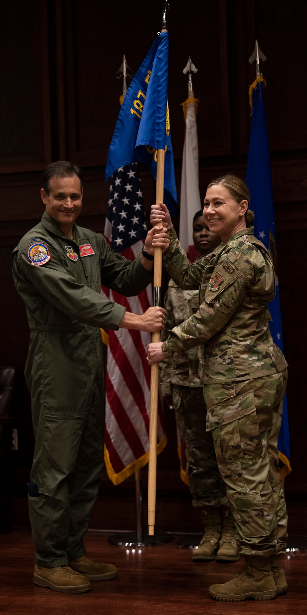 Lt. Col. Amy Z. Mundell assumes command of the 187th Medical Group as part of a change of command ceremony where Col. Tara D. McKennie relinquished command.