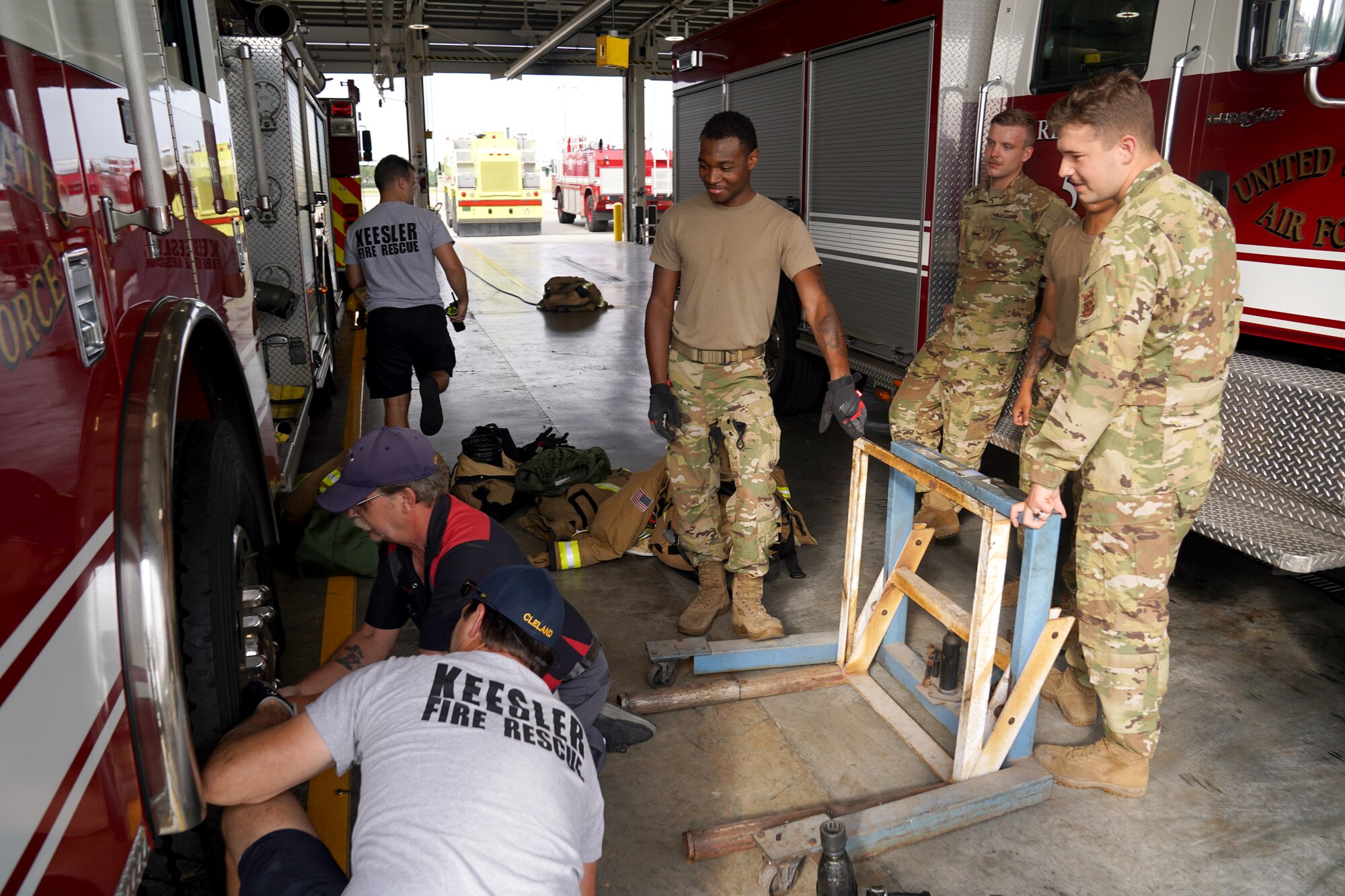 81st Civil Engineering Squadron Fire Department members prepare their equipment at the fire station at Keesler Air Force Base, Mississippi, June 2, 2021. The Keesler Fire Department responds to medical emergencies on and around base 24 hours a day. (U.S. Air Force photo by Senior Airman Seth Haddix)