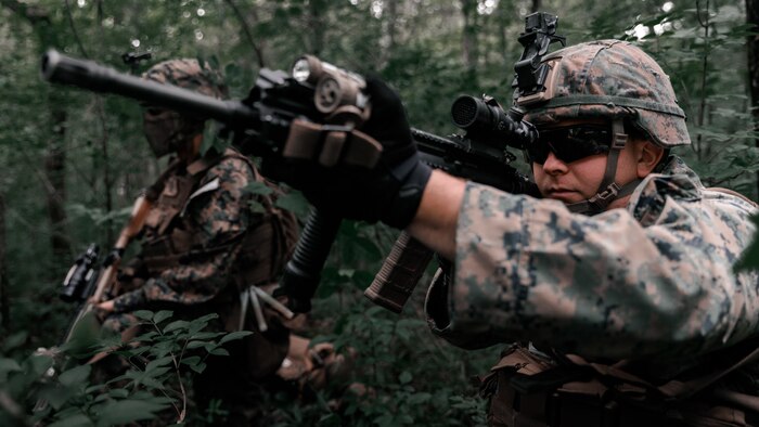 U.S. Marine Corps Cpl. Lucas Greene and Pfc. Luis Quiterio Reyes, both riflemen with 3rd Battalion, 2nd Marine Regiment, 2nd Marine Division, observe an objective point during Exercise Raven in Nashville, Tenn., May 29, 2021. Exercise Raven is an integrated training exercise with Marines from 3/2 and Marine Corps Forces Special Operations Command simulating real-life tactical scenarios to enhance overall unit interoperability, effectiveness and lethality against an adversarial force